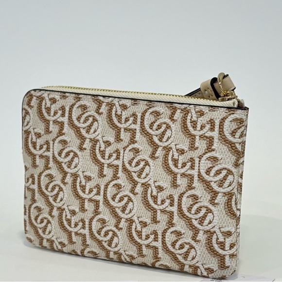 Coach Handbags - NWT COACH CORNER ZIP WRISTLET WALLET WITH SIGNATURE MONOGRAM PRINT
